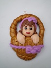 Pendentif poupée panier
