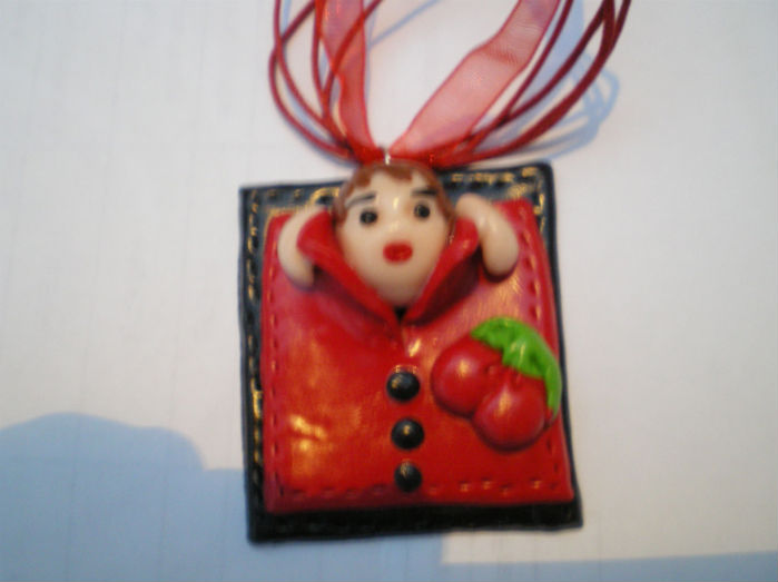 Pendentif bébé pocket rouge